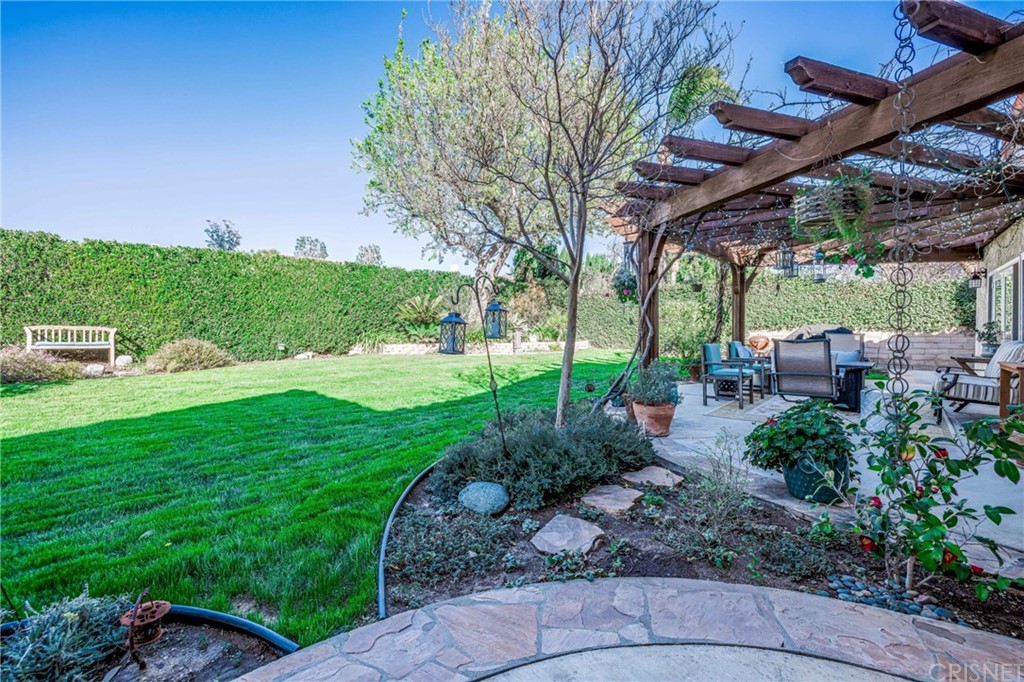 18261 Hiawatha Street Northridge, CA 91326 - Photo 30 of 35 a view of backyard with seating space