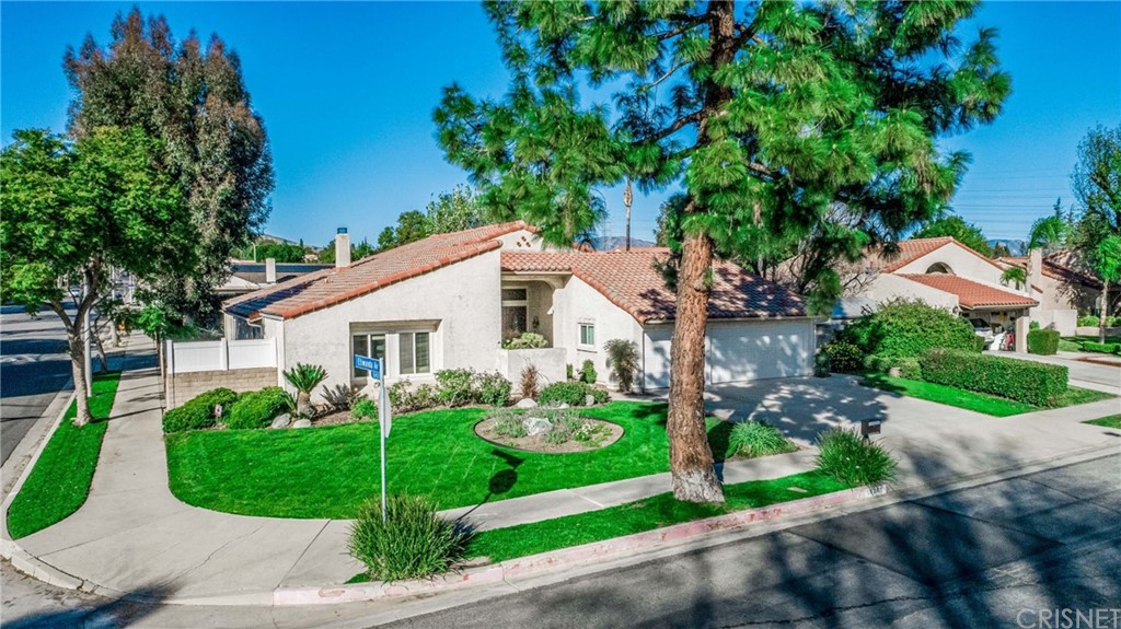 18261 Hiawatha Street Northridge, CA 91326 - Photo 35 of 35 a view of a house with a big yard plants and large trees