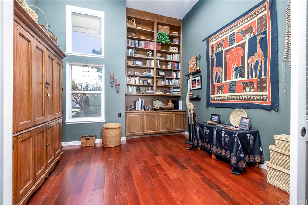 18261 Hiawatha Street Northridge, CA 91326 - Photo 9 of 35 a living room with furniture and wooden floor