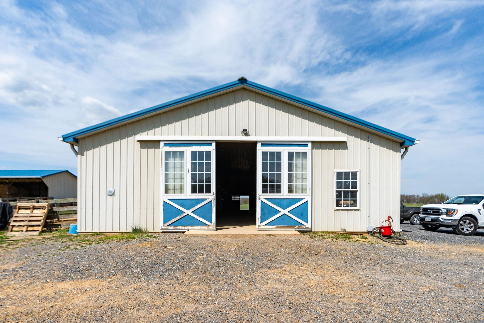309 Old B&O Road Raphine, VA 24472 - Photo 16 of 75 a view of a house with a patio and a yard