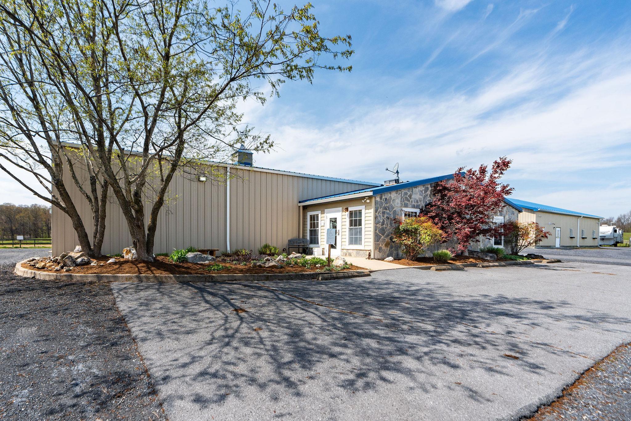 309 Old B&O Road Raphine, VA 24472 - Photo 56 of 75 a backyard of a house with barbeque oven and outdoor seating