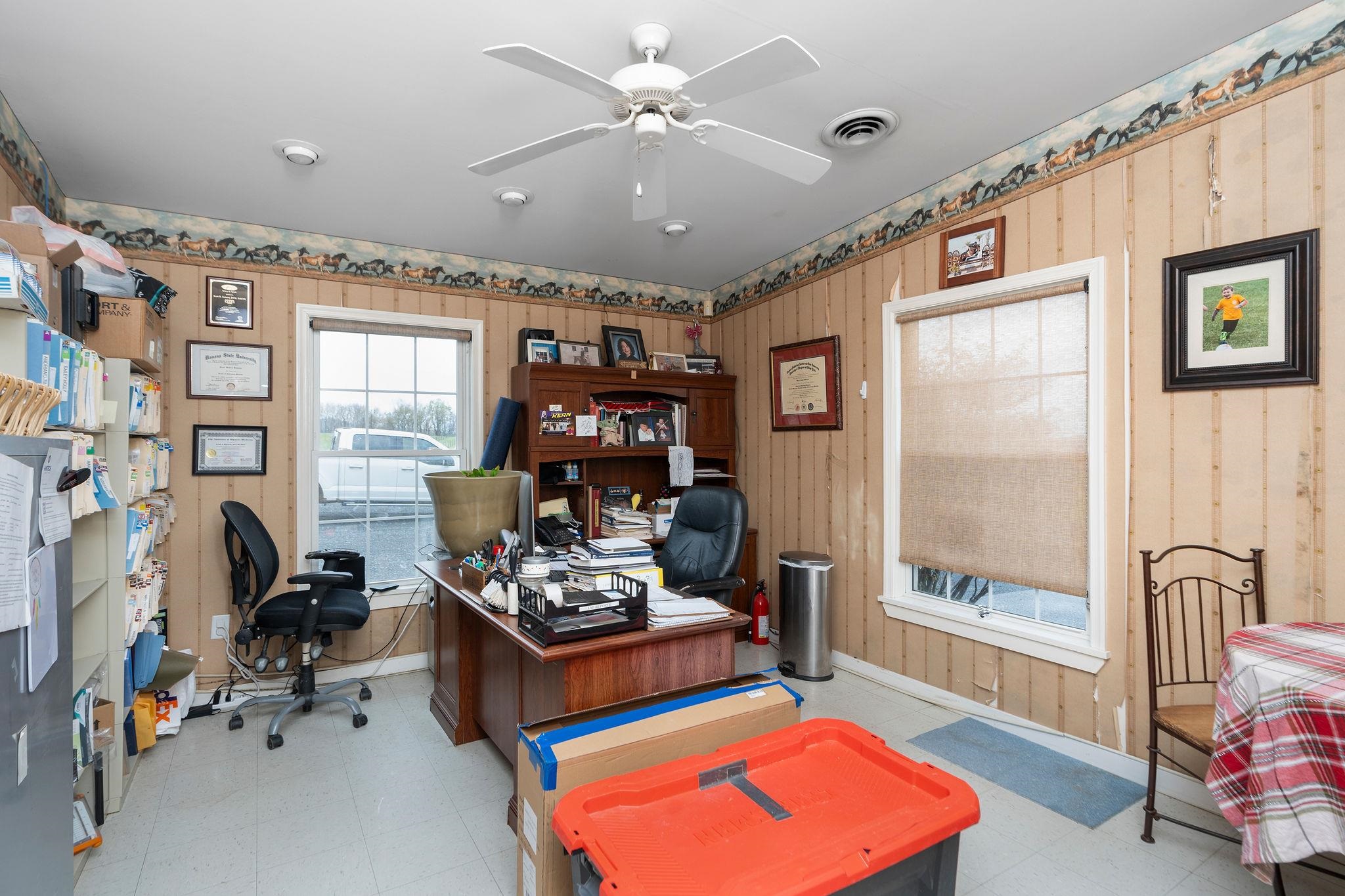 309 Old B&O Road Raphine, VA 24472 - Photo 9 of 75 a living room with furniture a rug and a chandelier