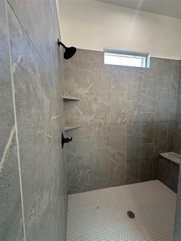 116 Blackstar Lane Decatur, TX 76234 - Photo 29 of 32 a bathroom with a bathtub and shower