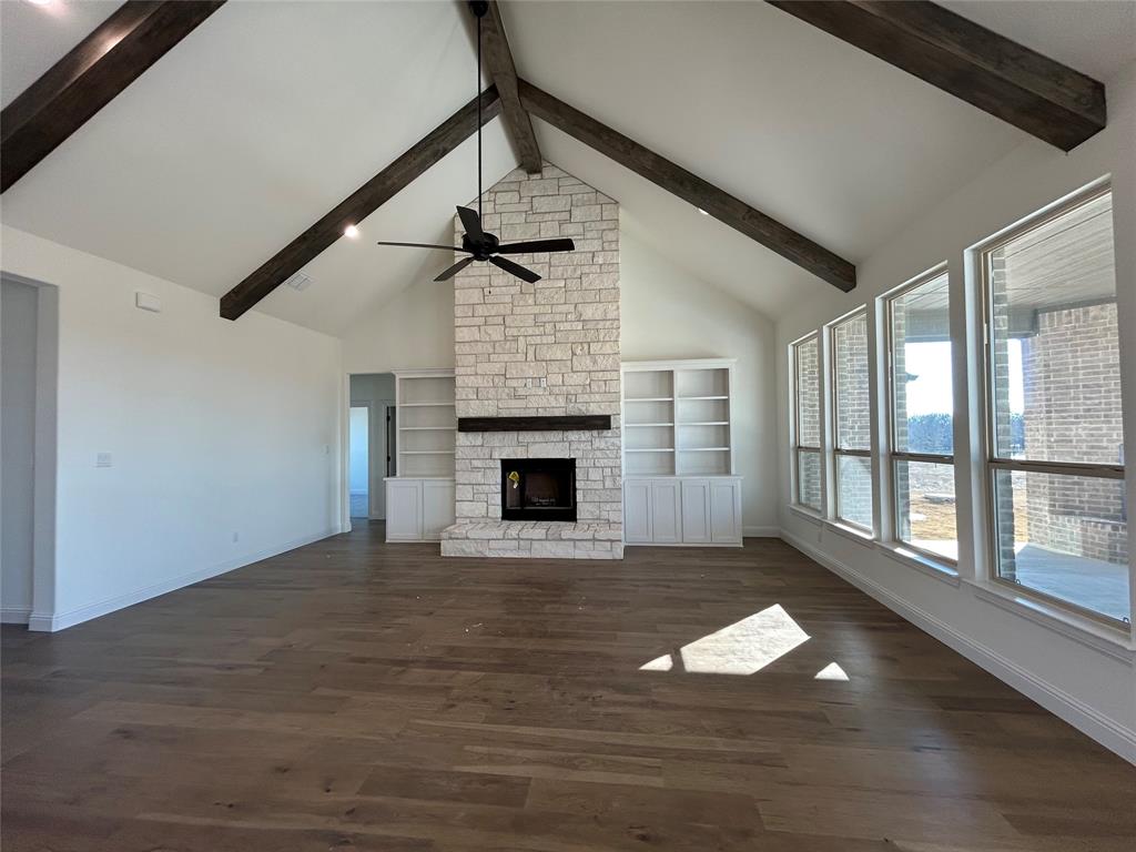 116 Blackstar Lane Decatur, TX 76234 - Photo 6 of 32 a view of empty room with wooden floor and fireplace
