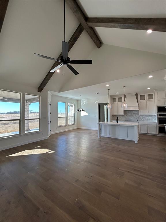 116 Blackstar Lane Decatur, TX 76234 - Photo 9 of 32 a view of large windows and a kitchen with a sink