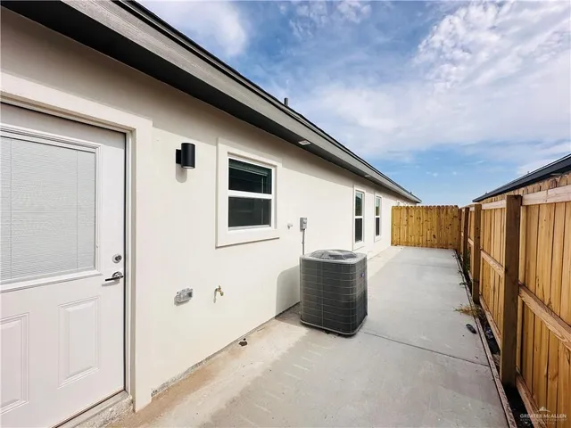 a view of backyard with outdoor seating