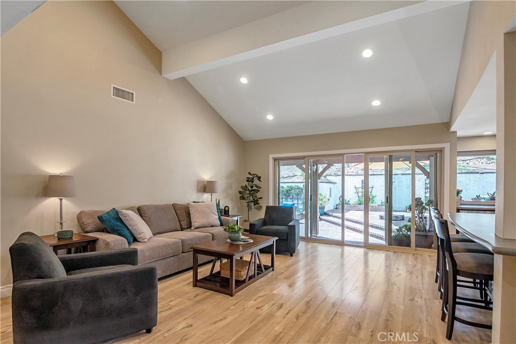 28604 Eagleton Street Agoura Hills, CA 91301 - Photo 13 of 72 a living room with furniture and a wooden floor