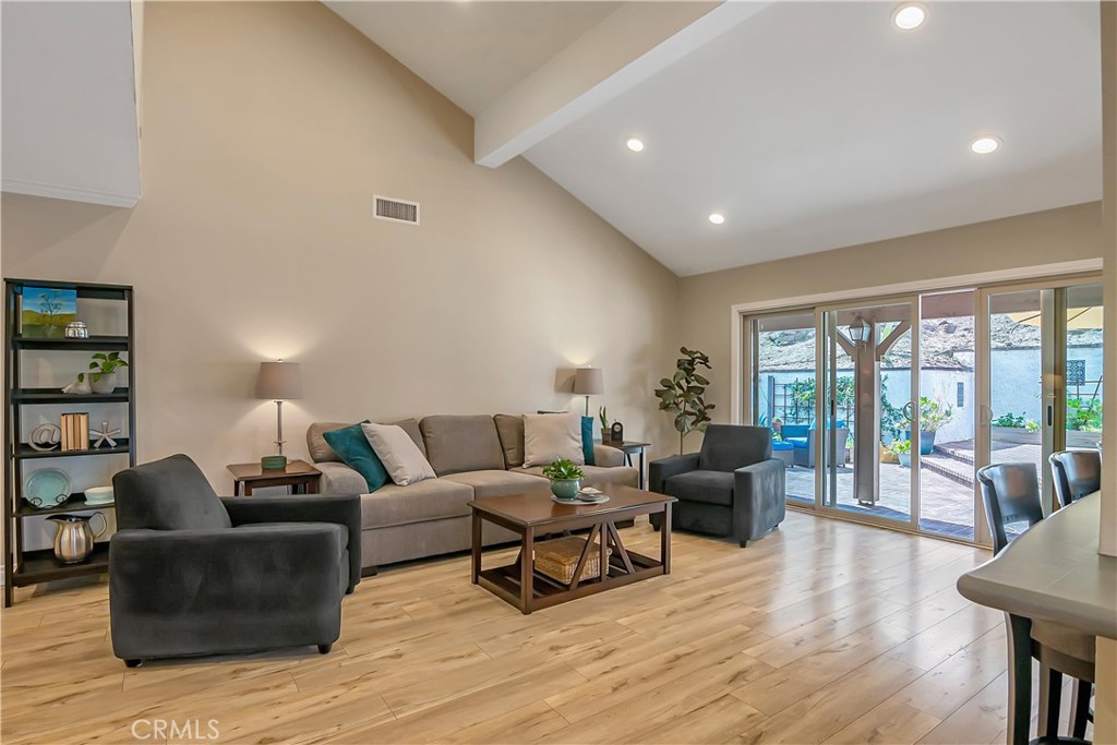 28604 Eagleton Street Agoura Hills, CA 91301 - Photo 14 of 72 a living room with furniture and a wooden floor
