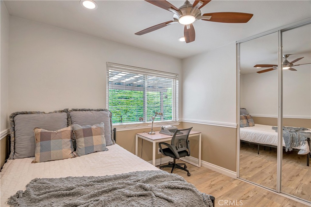 28604 Eagleton Street Agoura Hills, CA 91301 - Photo 29 of 72 a bedroom with a bed a desk and chair