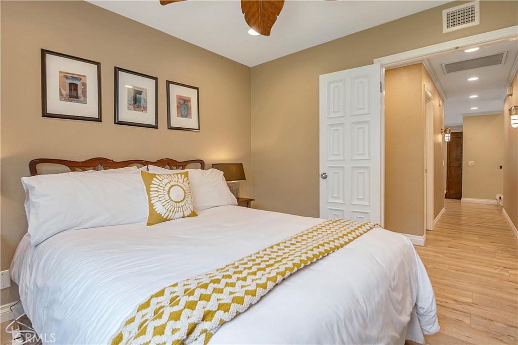 28604 Eagleton Street Agoura Hills, CA 91301 - Photo 34 of 72 a bedroom with bed and cupboard