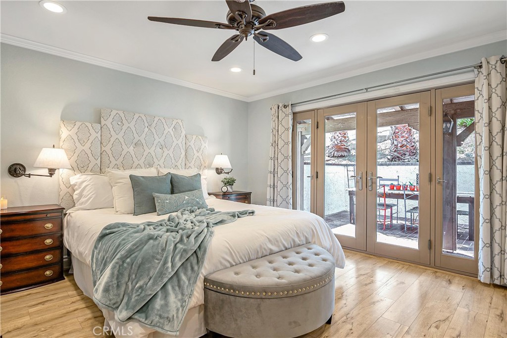 28604 Eagleton Street Agoura Hills, CA 91301 - Photo 37 of 72 a spacious bedroom with a bed and a large window