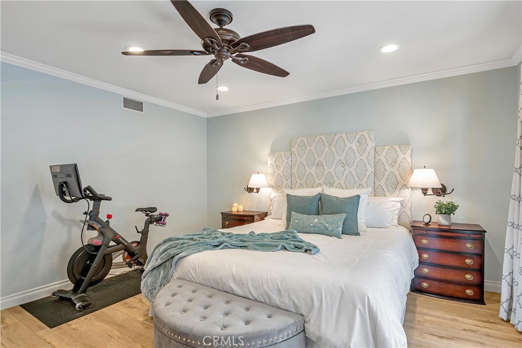 28604 Eagleton Street Agoura Hills, CA 91301 - Photo 39 of 72 a bedroom with a bed and wooden floor