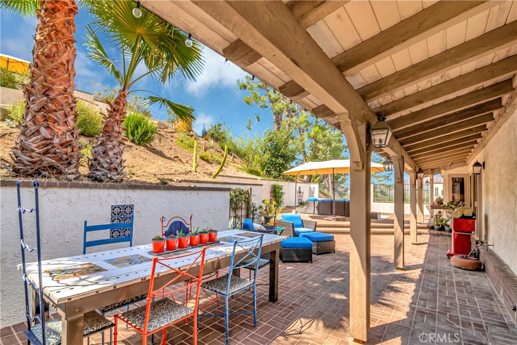 28604 Eagleton Street Agoura Hills, CA 91301 - Photo 52 of 72 a view of a tables and chairs in patio