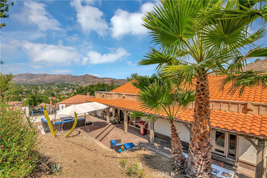 28604 Eagleton Street Agoura Hills, CA 91301 - Photo 59 of 72 a view of a house with a yard