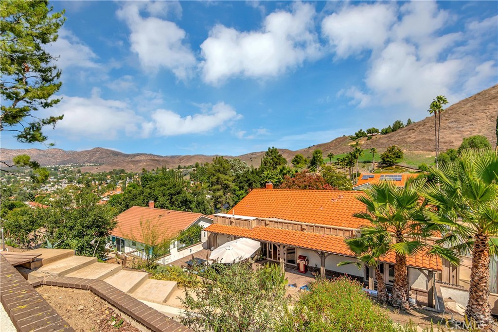28604 Eagleton Street Agoura Hills, CA 91301 - Photo 63 of 72 a view of a terrace with a garden