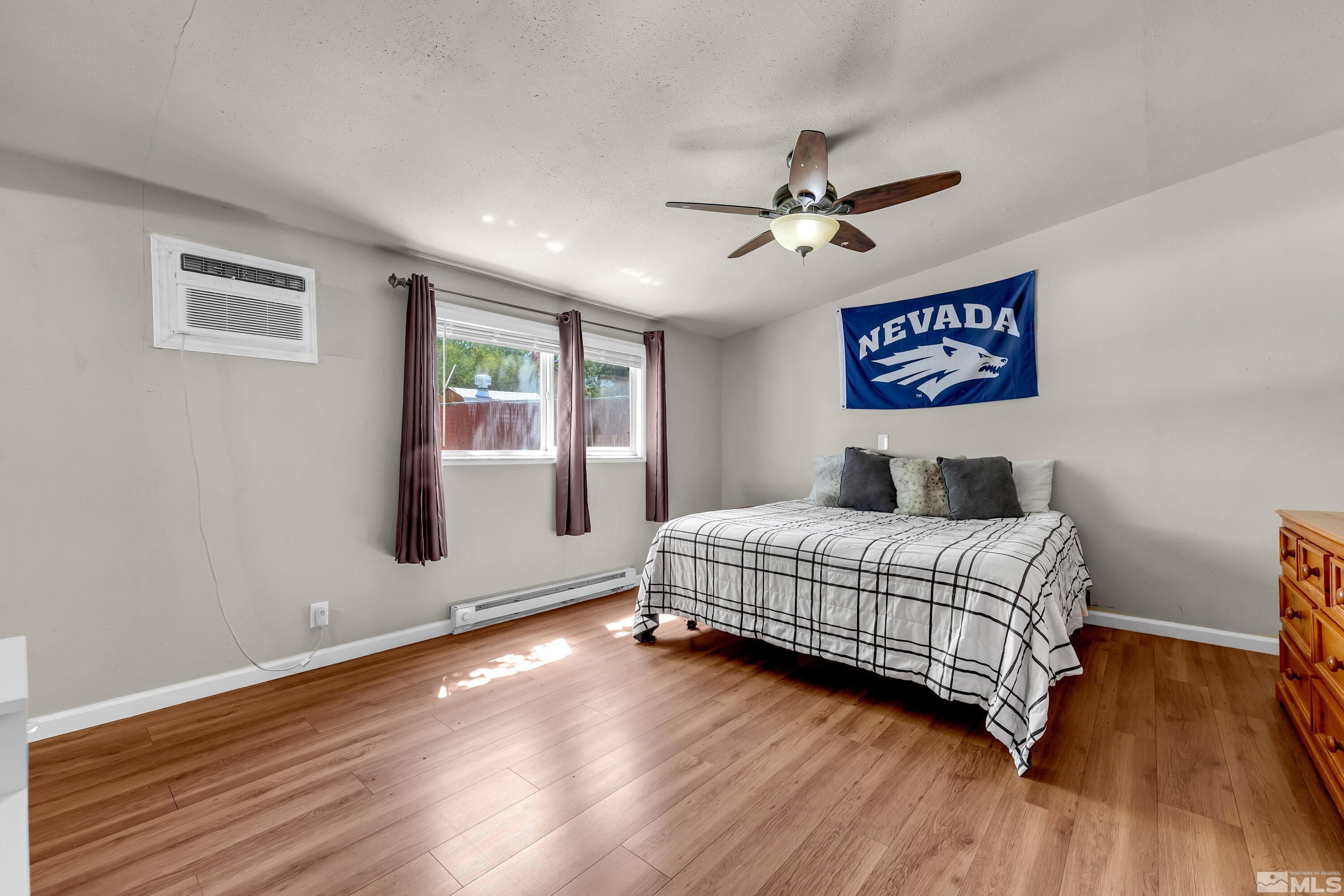 1615 Keystone Avenue Reno, NV 89503 - Photo 16 of 40 a bedroom with a bed and a window
