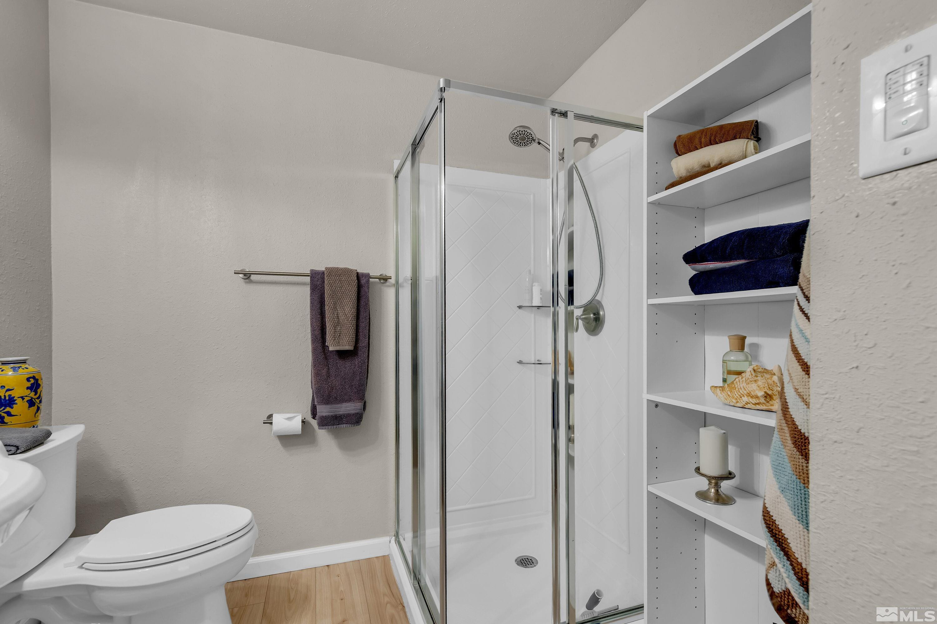 1615 Keystone Avenue Reno, NV 89503 - Photo 29 of 40 a bathroom with a shower and toilet