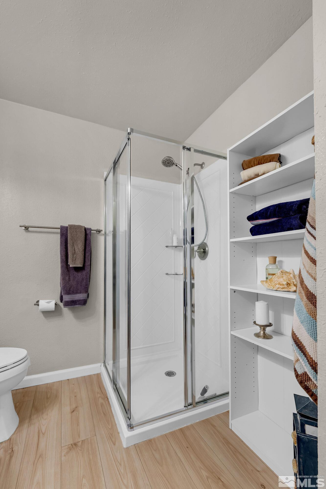 1615 Keystone Avenue Reno, NV 89503 - Photo 30 of 40 a bathroom with a shower and a toilet