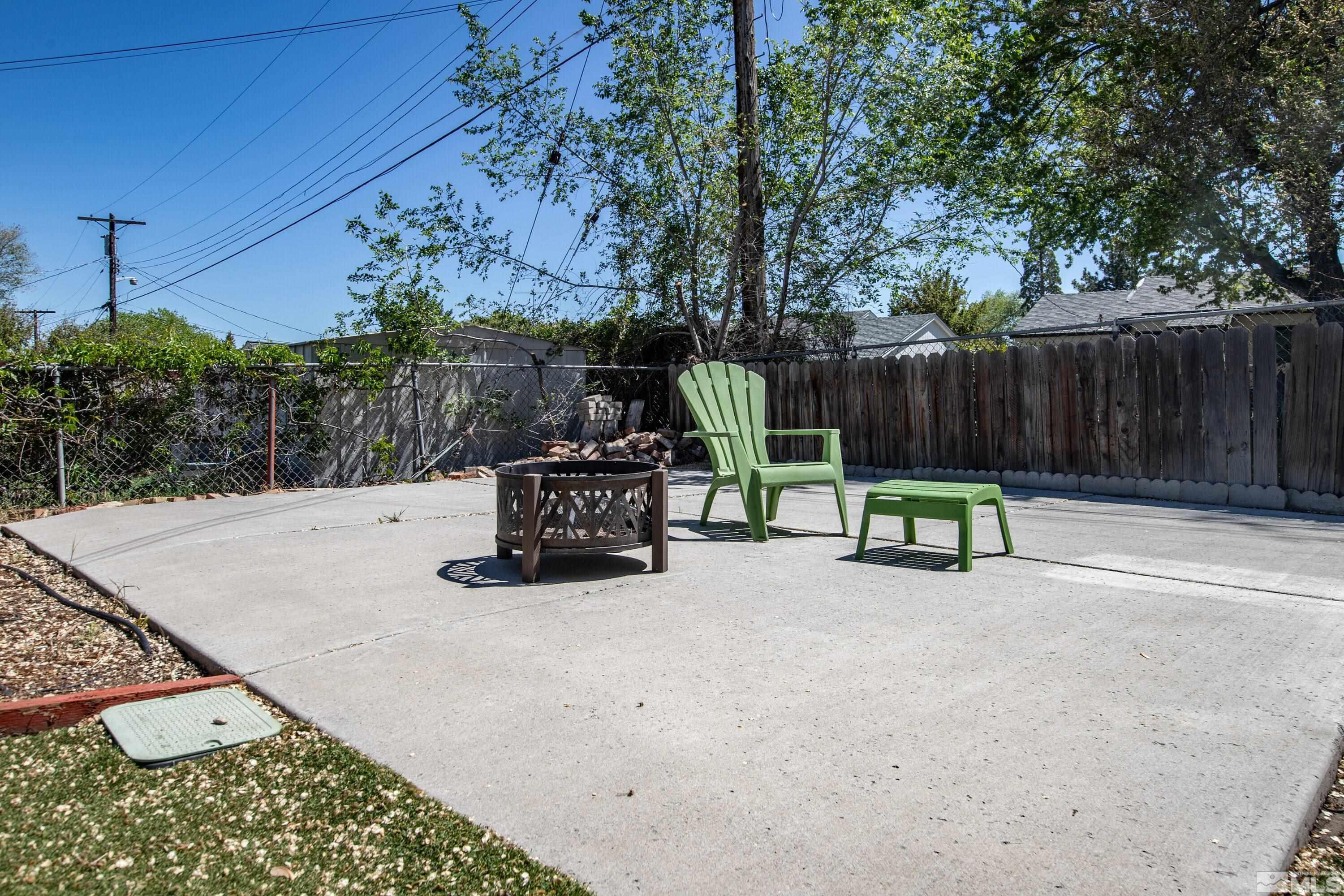 1615 Keystone Avenue Reno, NV 89503 - Photo 34 of 40 a view of a bench with wooden fence