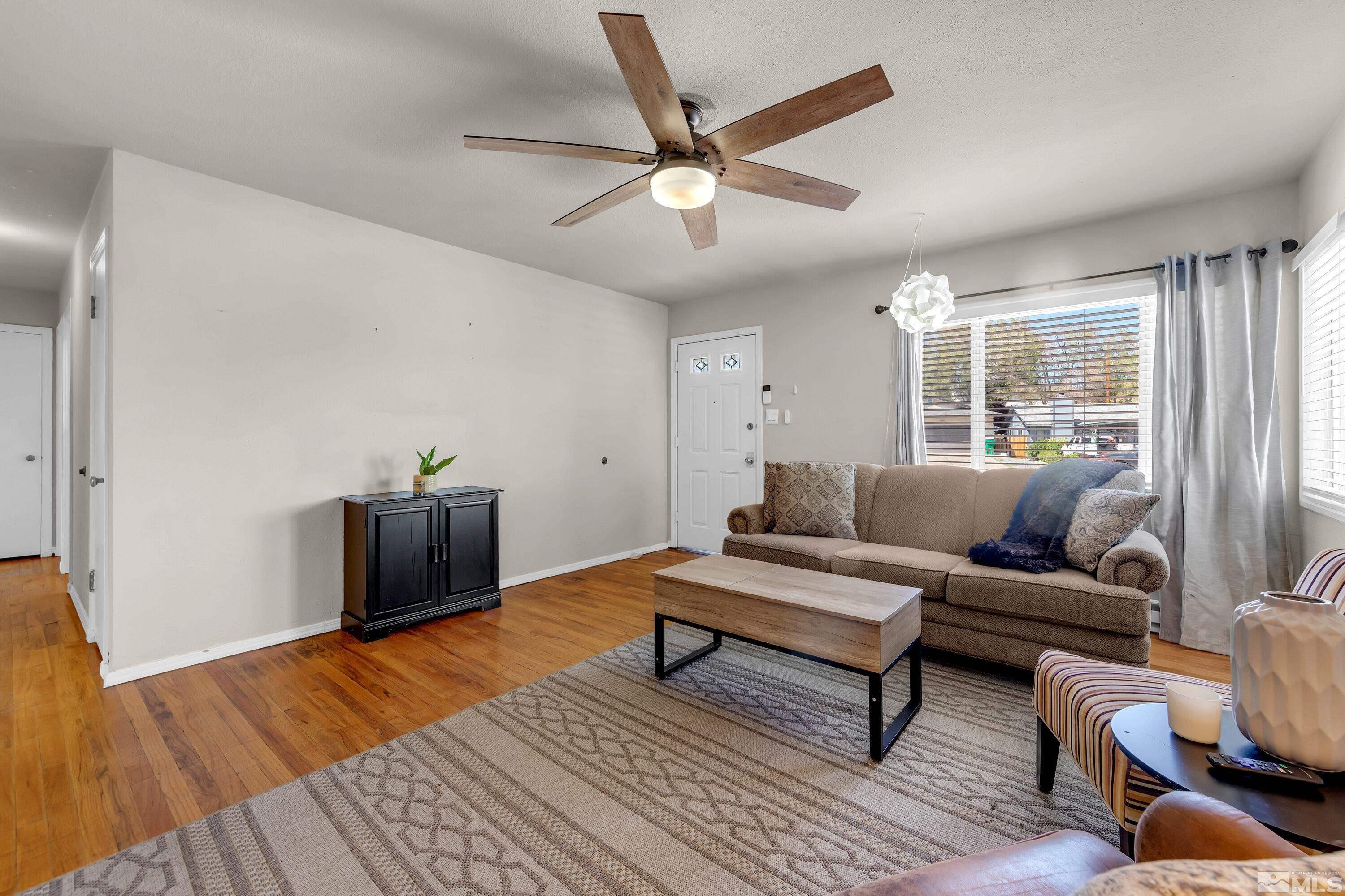 1615 Keystone Avenue Reno, NV 89503 - Photo 4 of 40 a living room with furniture and a rug