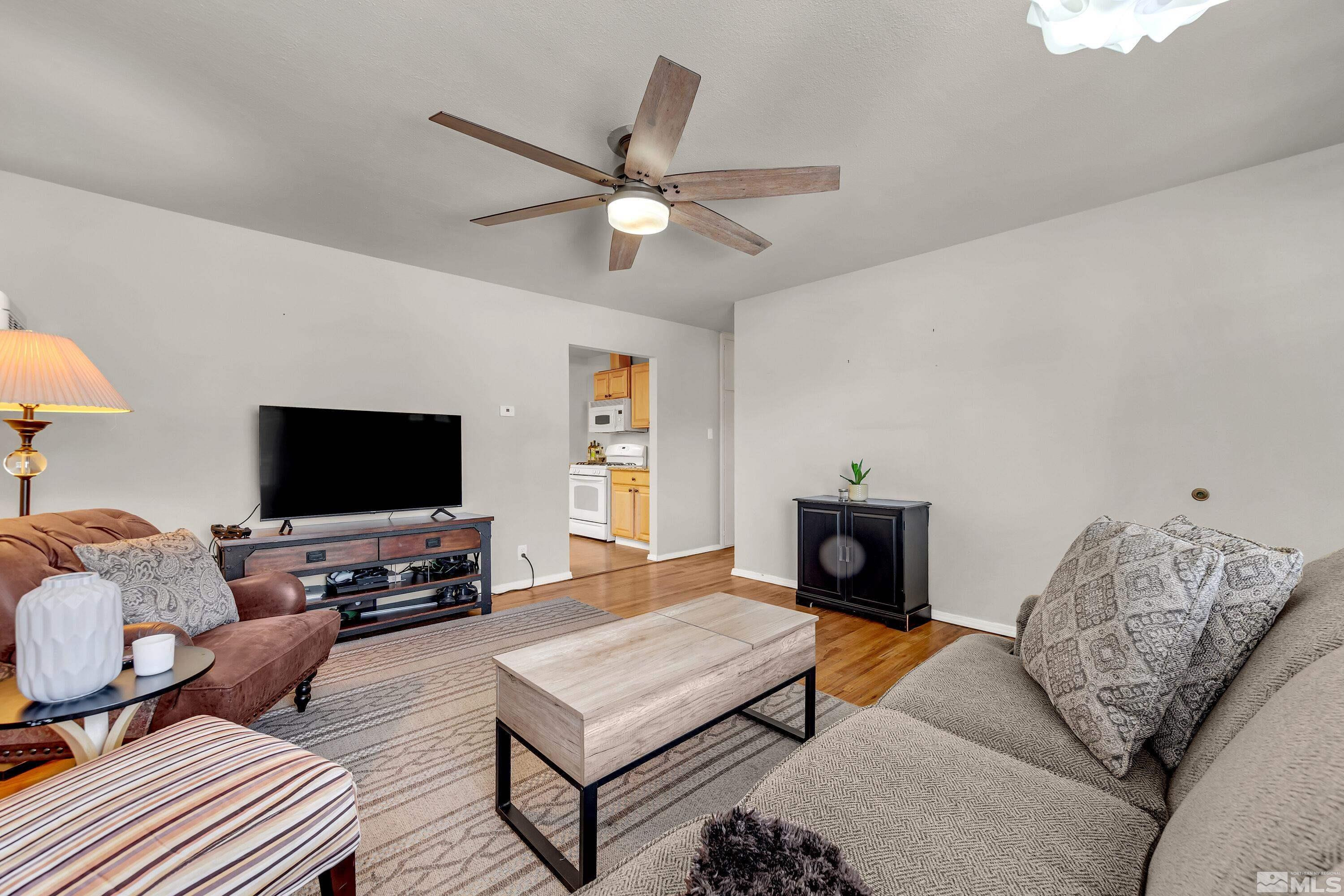 1615 Keystone Avenue Reno, NV 89503 - Photo 5 of 40 a living room with furniture and a flat screen tv