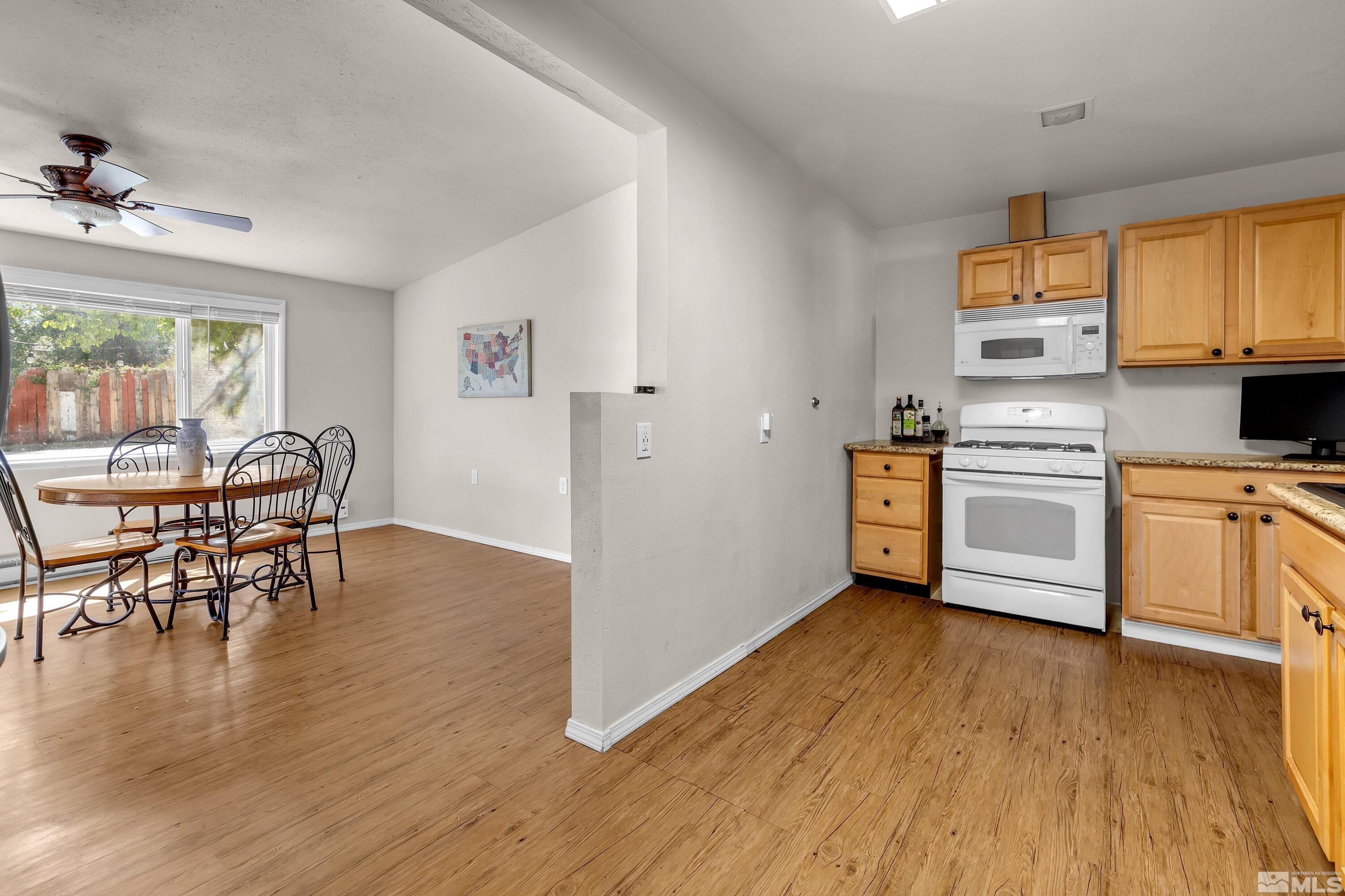 1615 Keystone Avenue Reno, NV 89503 - Photo 10 of 40 a kitchen with a stove a sink and a refrigerator