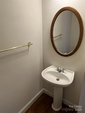 a view of an empty room with a fireplace