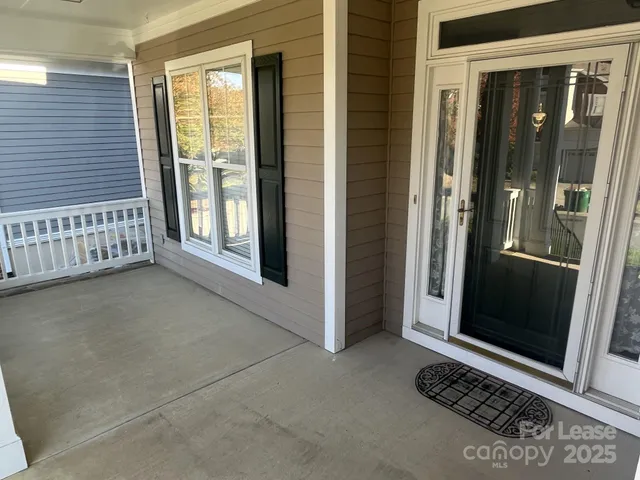 a view of front door with a glass door