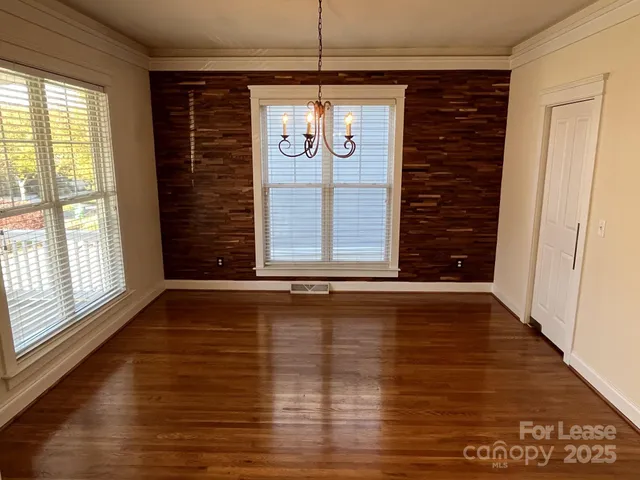 a kitchen with sink refrigerator and microwave