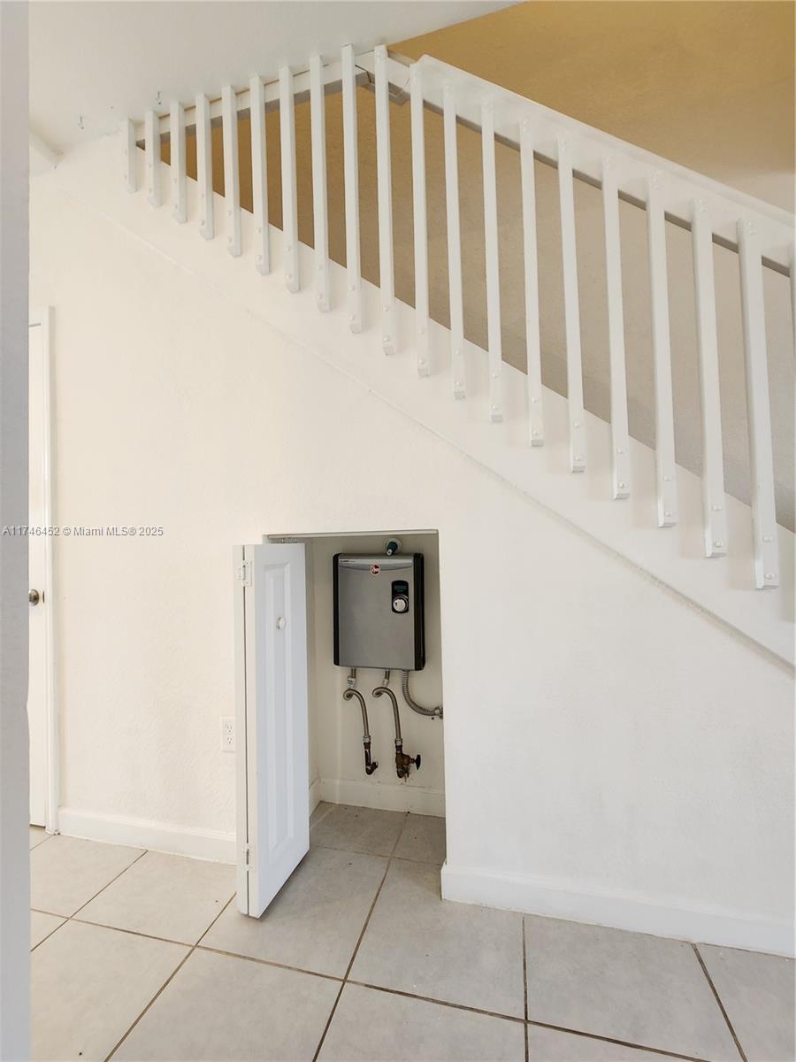 18232 Southwest 148th Road, Unit 18232 Miami, FL 33187 - Photo 16 of 44 a view of entryway with bathroom