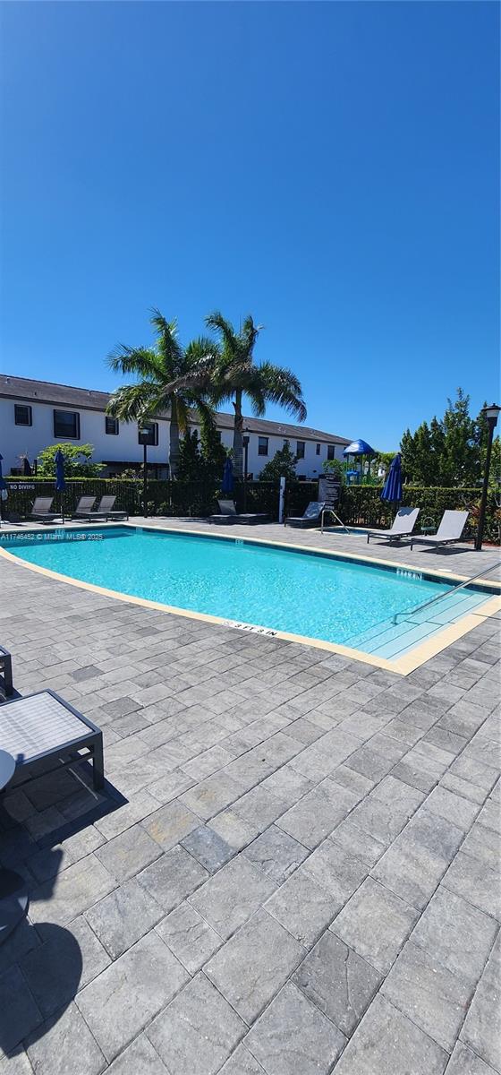 18232 Southwest 148th Road, Unit 18232 Miami, FL 33187 - Photo 36 of 44 a view of a stadium that has a big playing yard
