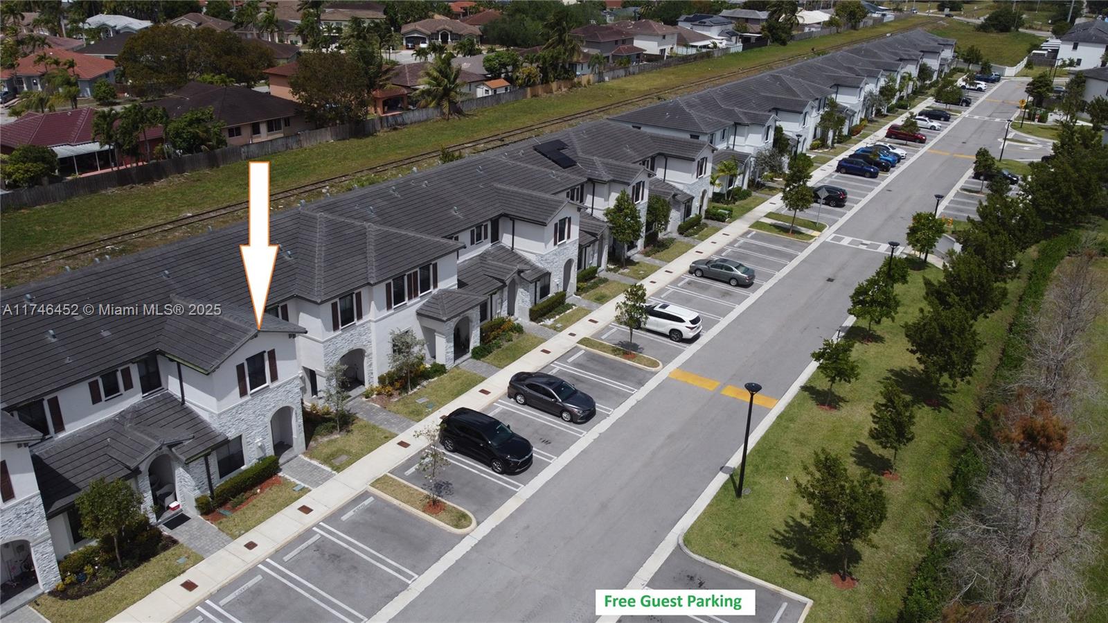 18232 Southwest 148th Road, Unit 18232 Miami, FL 33187 - Photo 38 of 44 an aerial view of multiple houses with yard