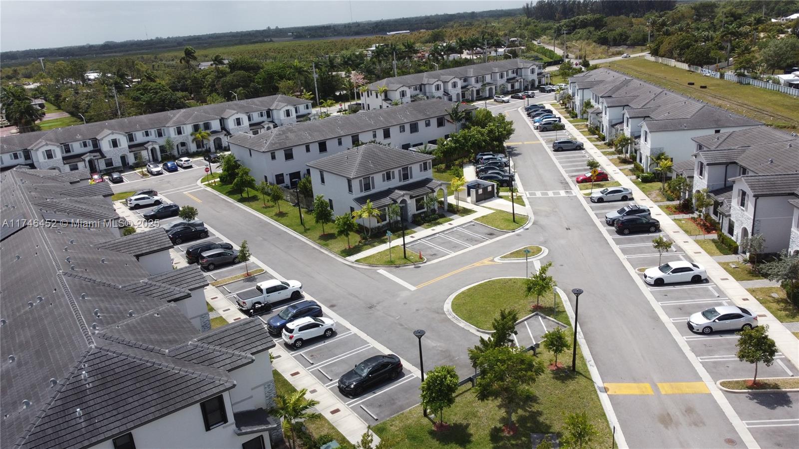 18232 Southwest 148th Road, Unit 18232 Miami, FL 33187 - Photo 39 of 44 an aerial view of a house with a garden