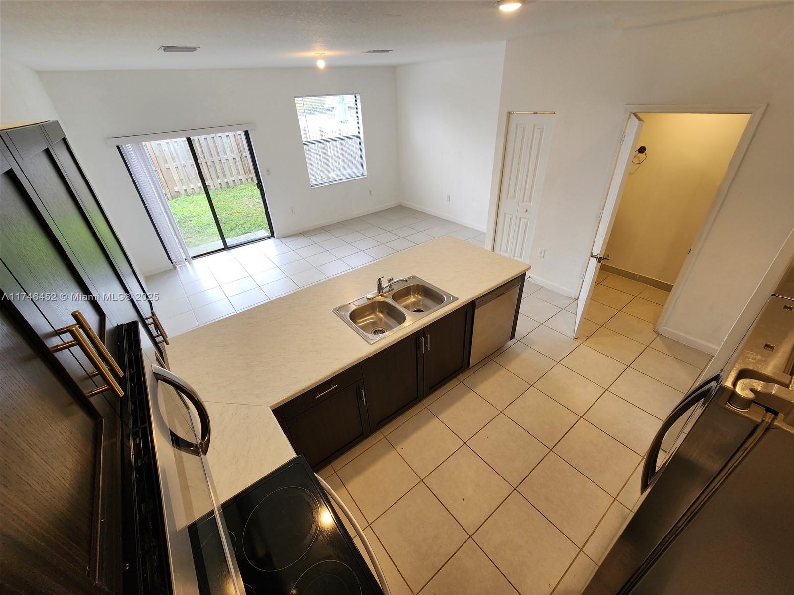 18232 Southwest 148th Road, Unit 18232 Miami, FL 33187 - Photo 8 of 44 a view of front door