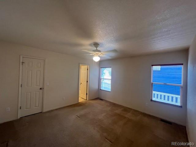 5752 Gallantry Lane Colorado Springs, CO 80923 - Photo 15 of 35 a view of an empty room with a window