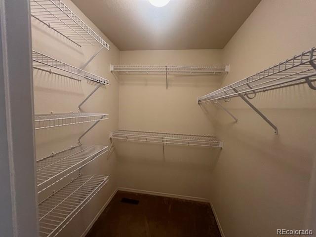 5752 Gallantry Lane Colorado Springs, CO 80923 - Photo 21 of 35 a view of a room with racks on the wall