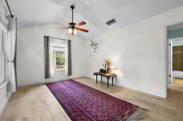 a view of a livingroom with a workspace