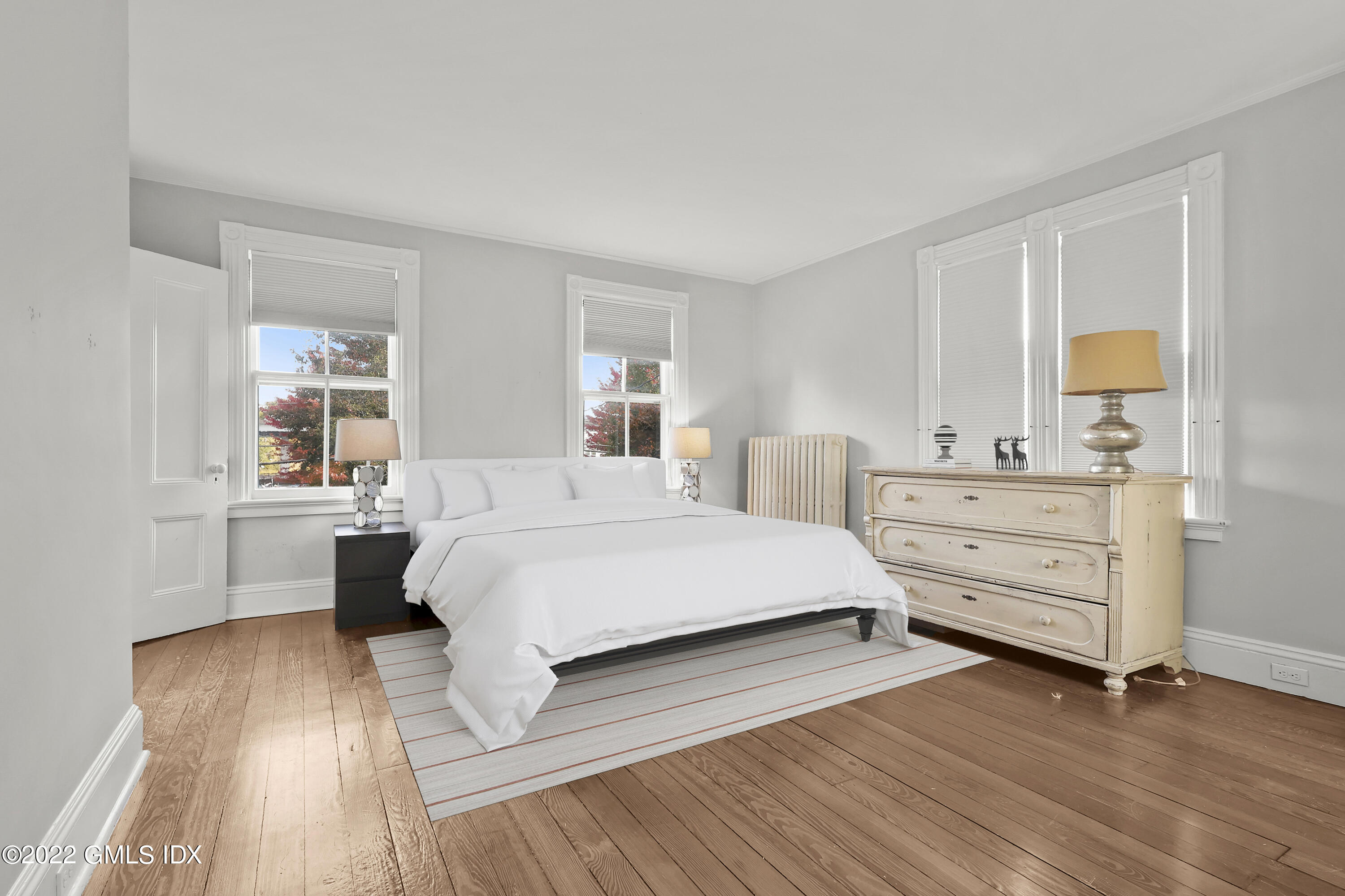 60 River Road Cos Cob, CT 06807 - Photo 16 of 31 a bedroom with a bed and a dresser