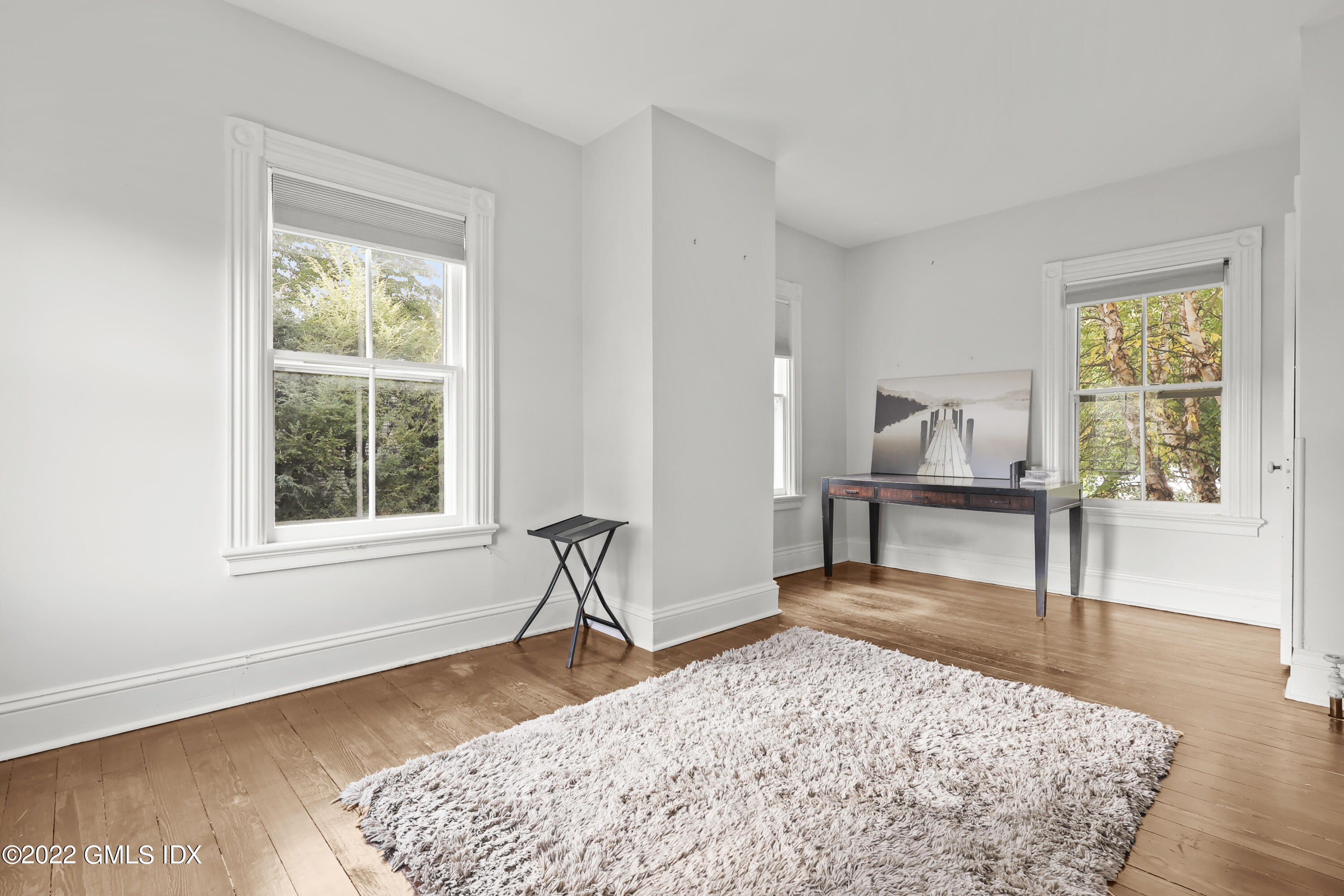 60 River Road Cos Cob, CT 06807 - Photo 21 of 31 a view of a livingroom with wooden floor and a window