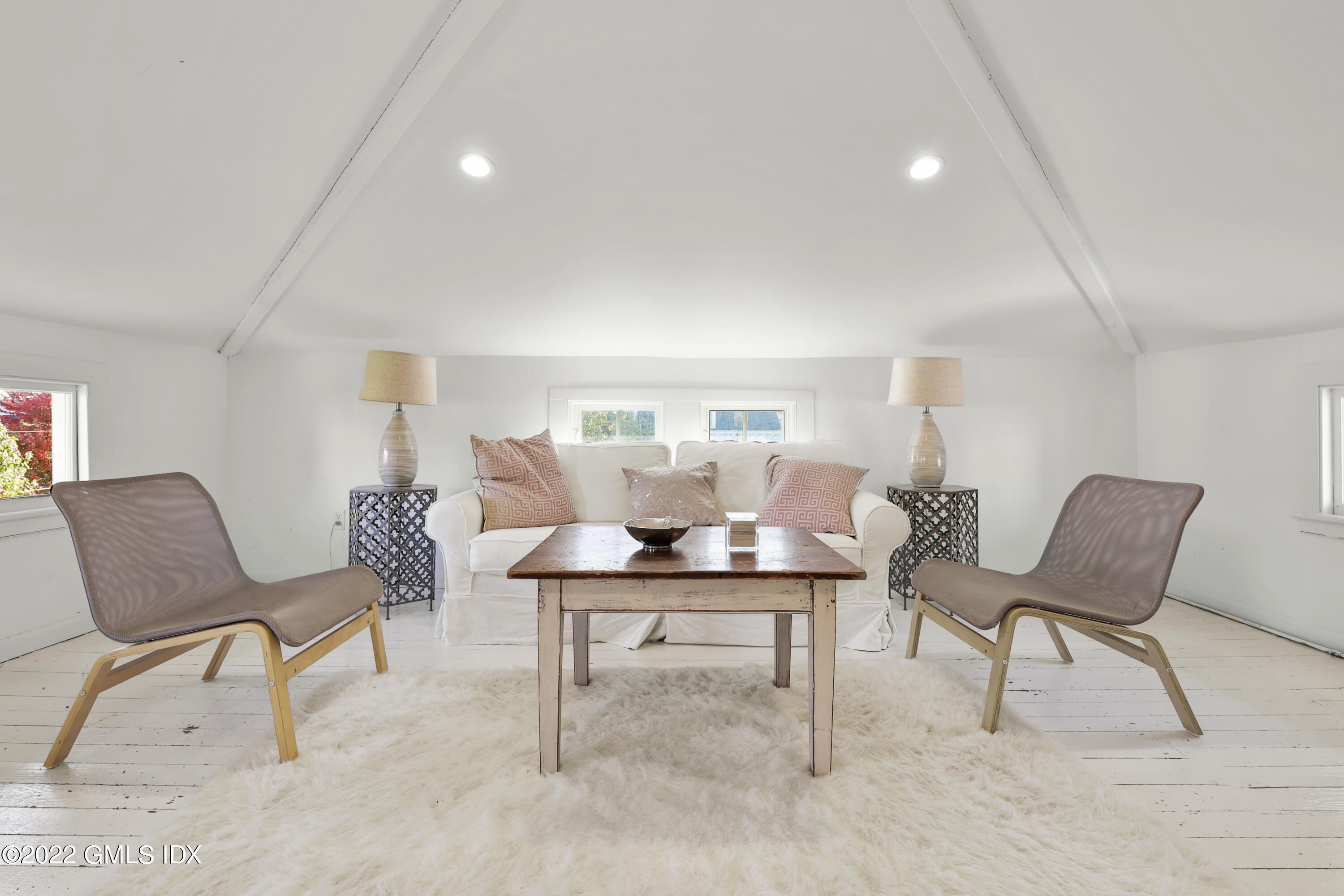 60 River Road Cos Cob, CT 06807 - Photo 23 of 31 a living room with furniture and a table