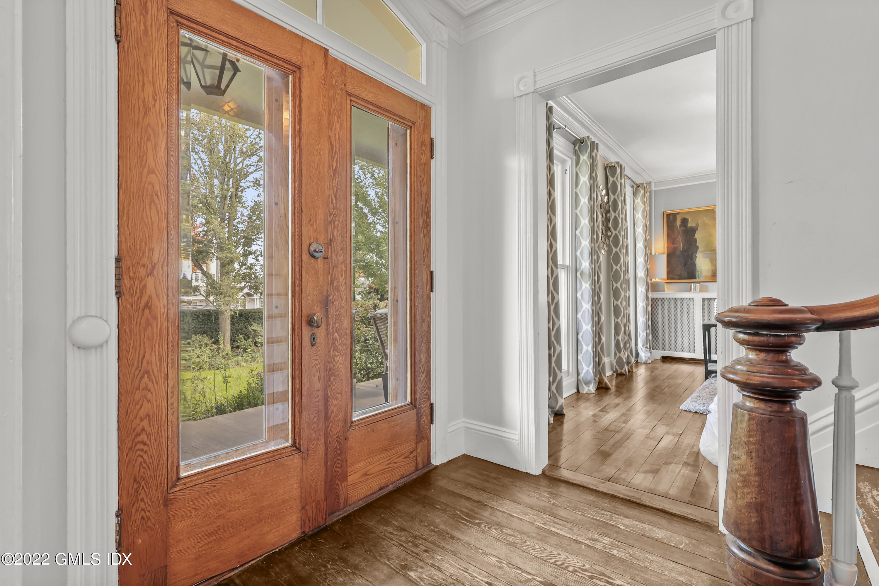 60 River Road Cos Cob, CT 06807 - Photo 3 of 31 a view of a hallway with windows and main door