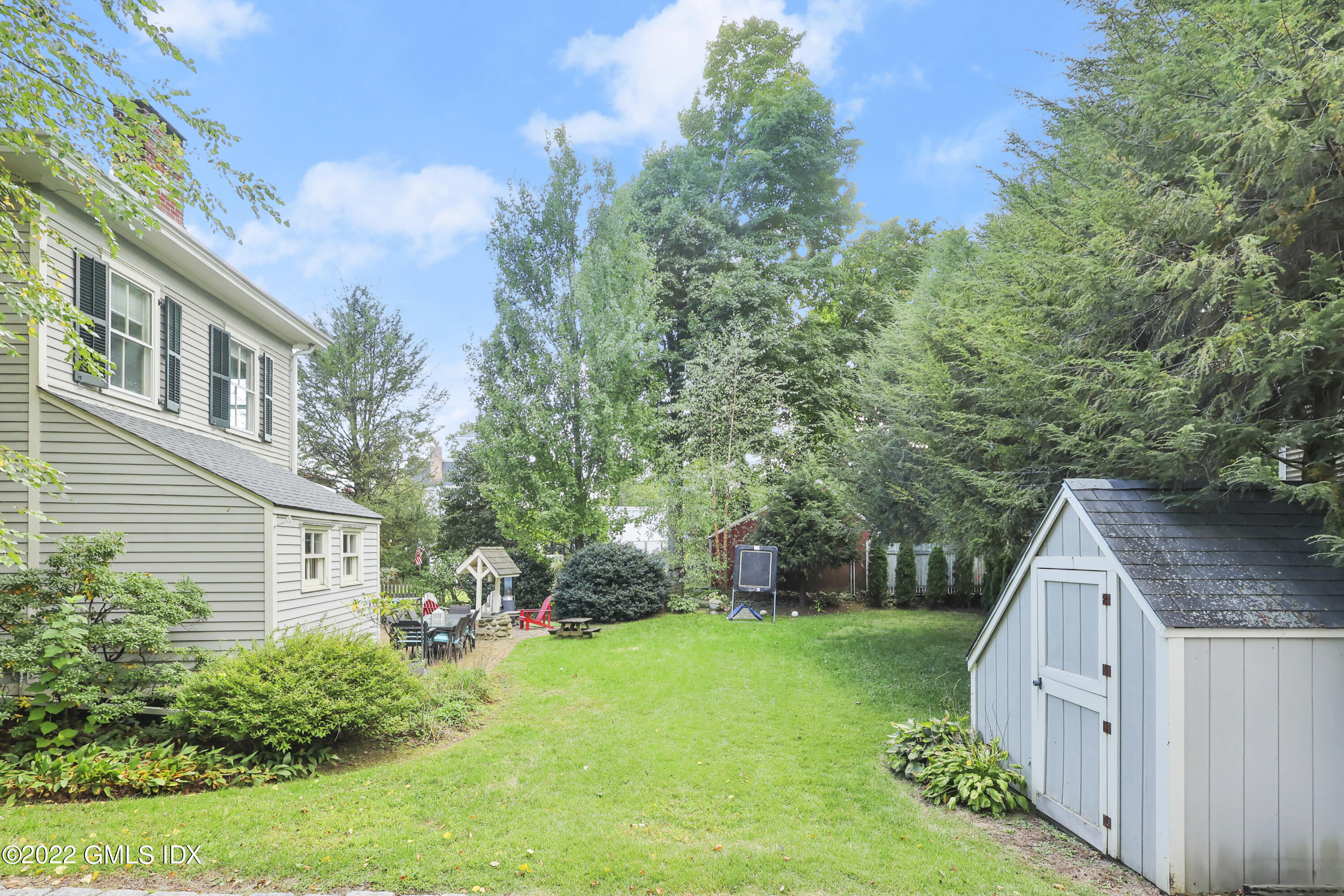60 River Road Cos Cob, CT 06807 - Photo 31 of 31 a view of a house with backyard and garden