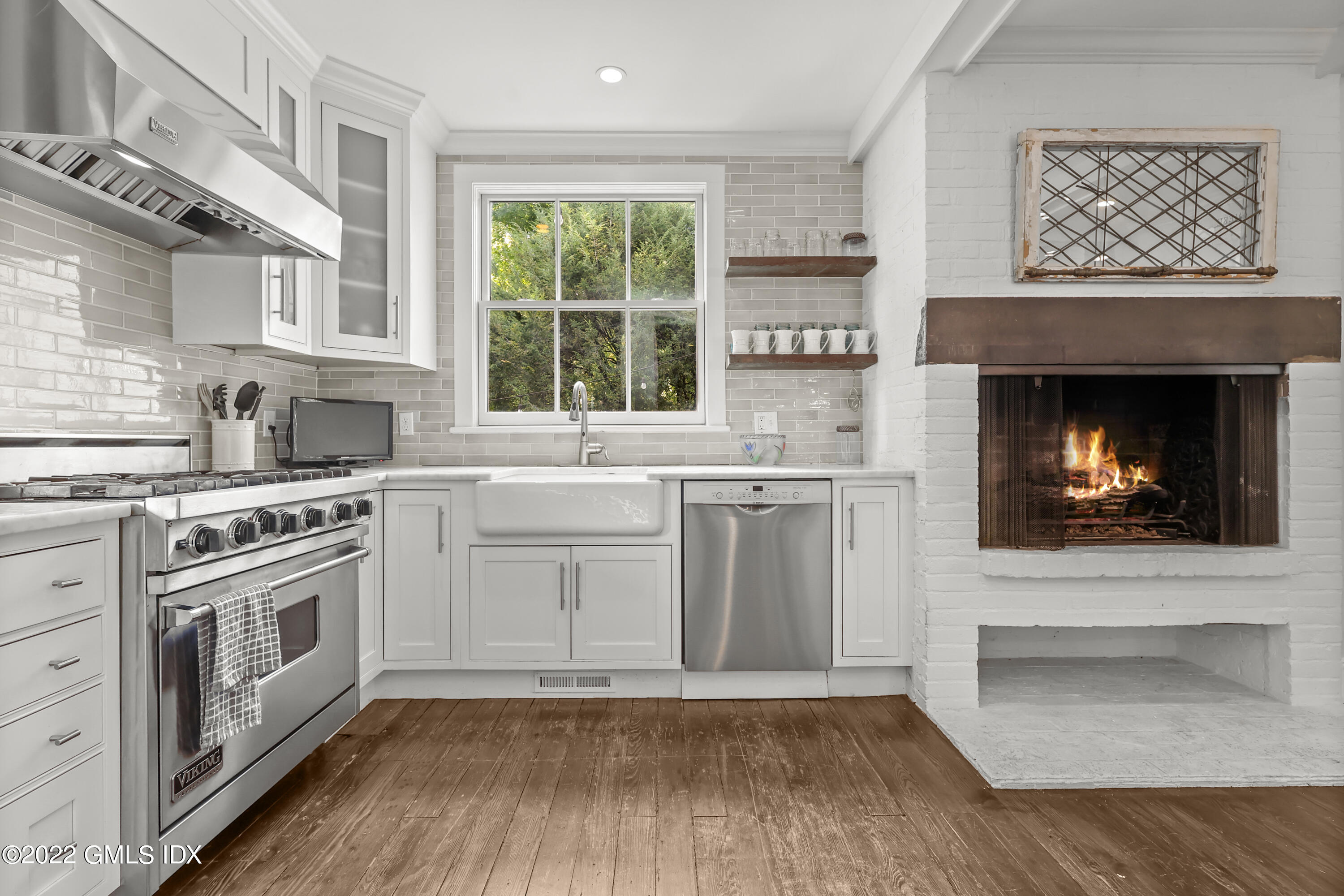 60 River Road Cos Cob, CT 06807 - Photo 10 of 31 a kitchen with a stove oven and sink