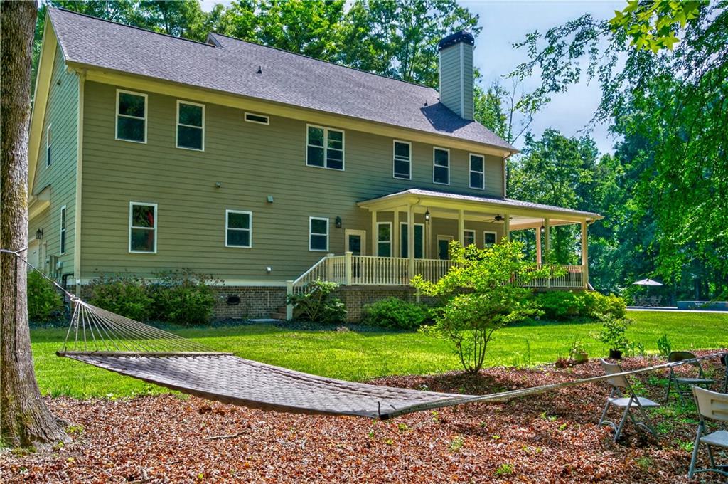 632 Geiger Road Jefferson, GA 30549 - Photo 51 of 55 a front view of a house with a yard