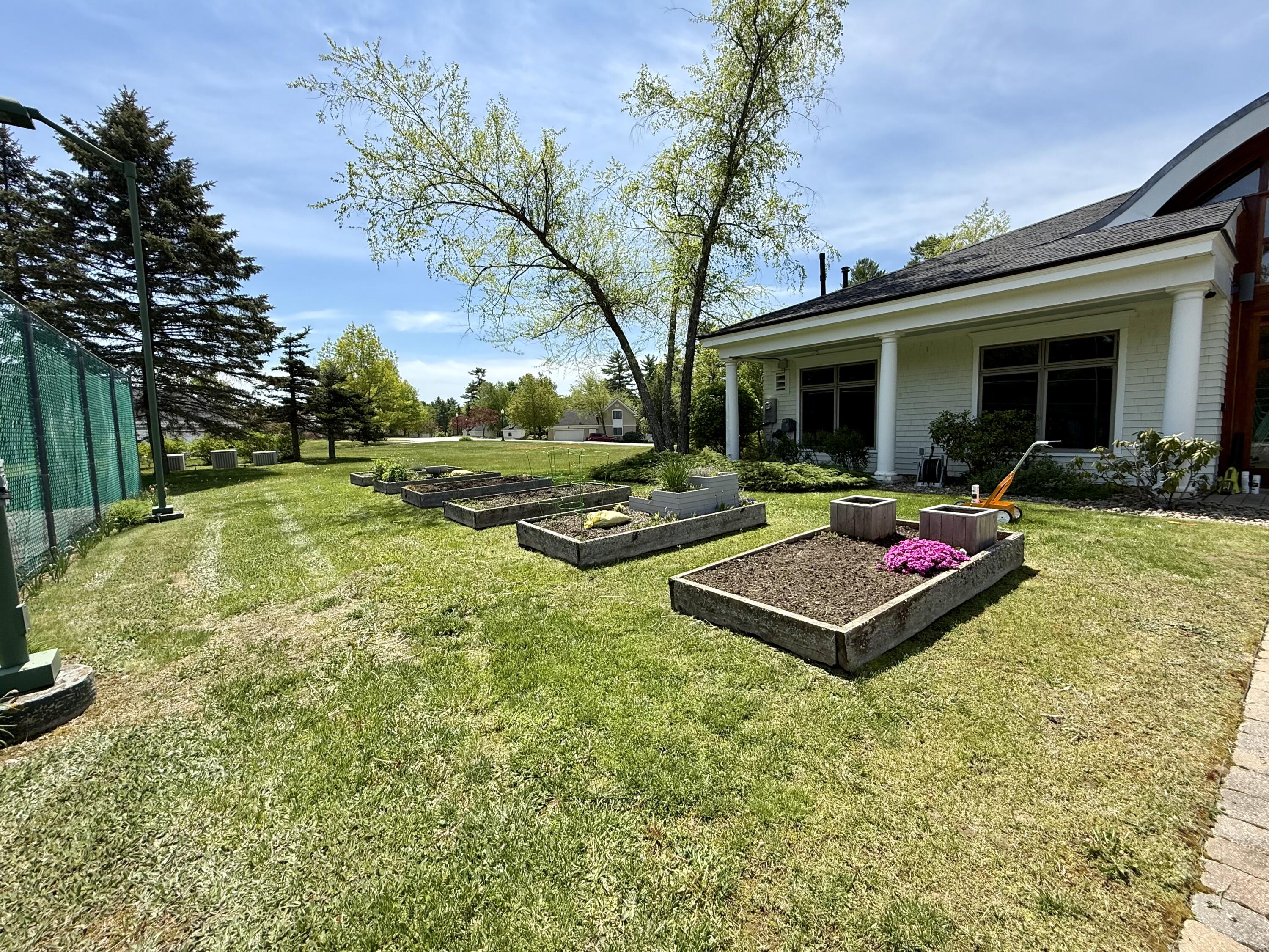 20 Springbrook Drive, Unit C Belfast, ME 04915 - Photo 35 of 40 Raised Gardening Beds-common area