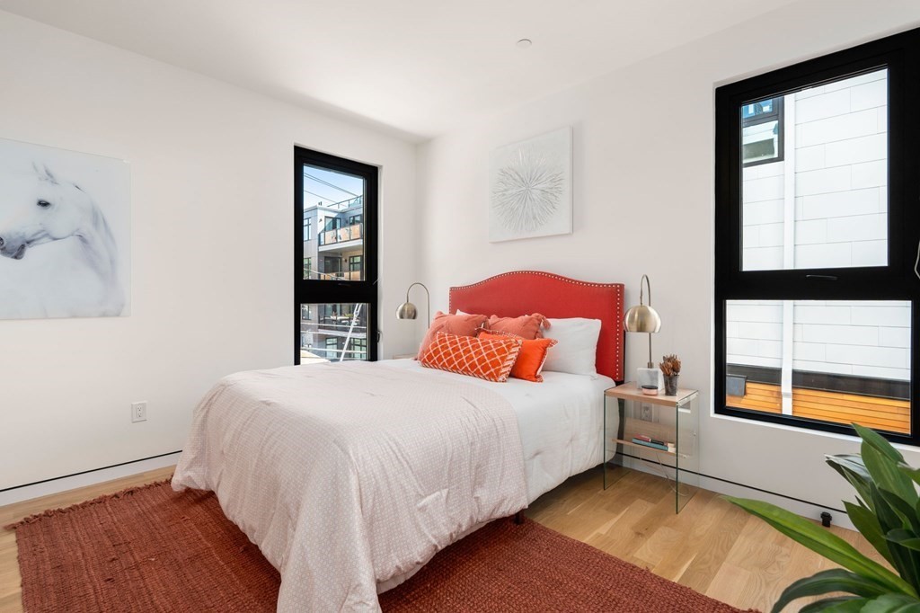 43 Stearns Road, Unit SF Brookline, MA 02446 - Photo 15 of 19 a bedroom with a bed and window