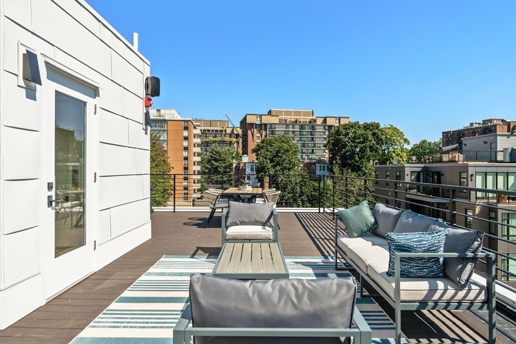43 Stearns Road, Unit SF Brookline, MA 02446 - Photo 18 of 19 a view of roof deck with patio