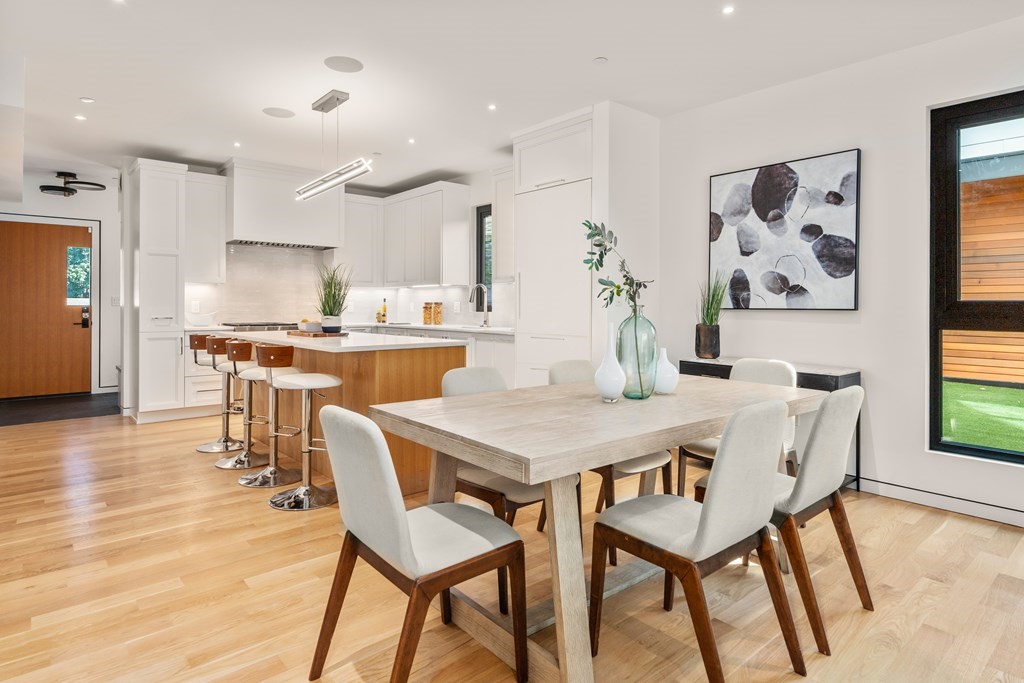 43 Stearns Road, Unit SF Brookline, MA 02446 - Photo 3 of 19 a view of a dining room with furniture and wooden floor