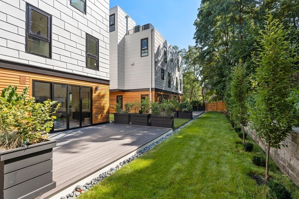 43 Stearns Road, Unit SF Brookline, MA 02446 - Photo 9 of 19 a front view of a house with garden