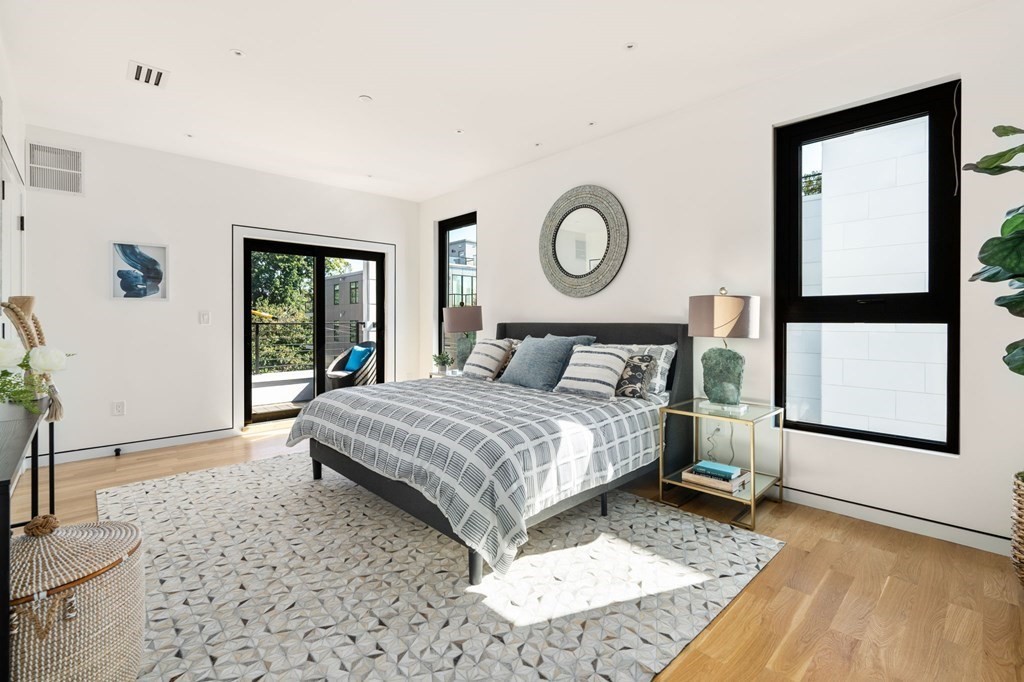 43 Stearns Road, Unit SF Brookline, MA 02446 - Photo 10 of 19 a bedroom with a bed and window